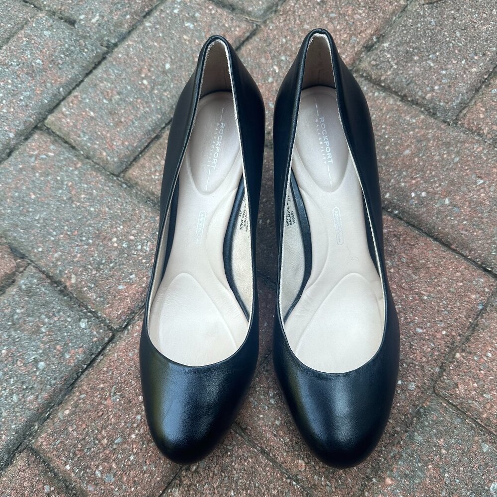 Rockport black leather pumps.